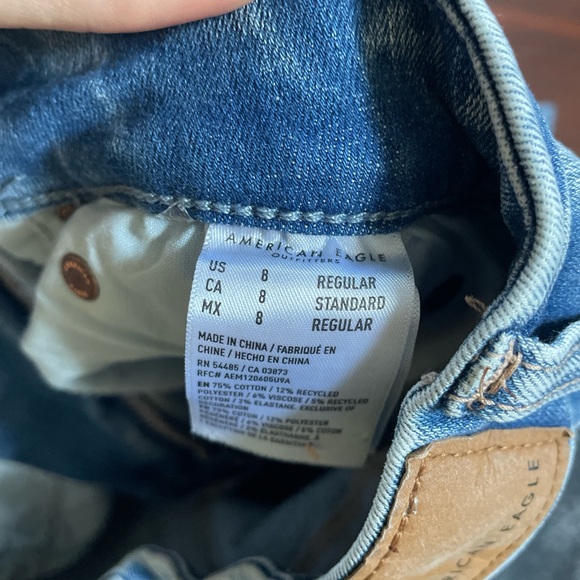 American Eagle High Rise Crossover Waist Ripped Flare Jean - Picture 5 of 5